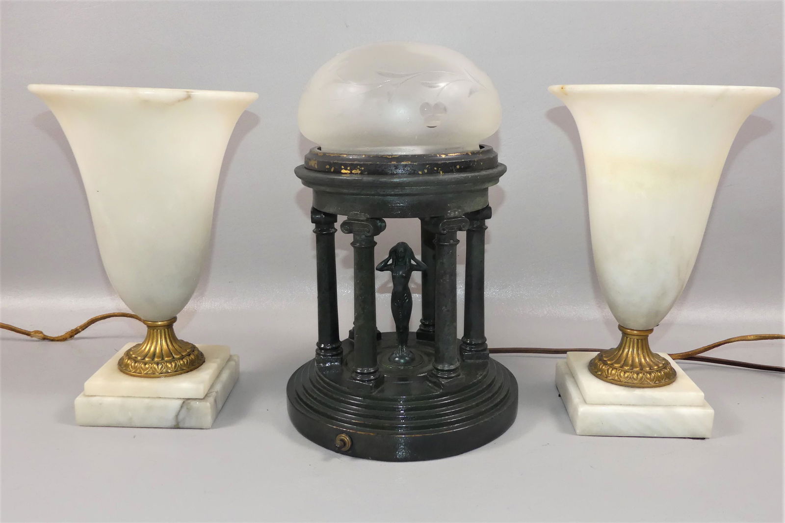 3 ART DECO TABLE LAMPS: Lot 3 Art Deco era table lamps including pair of white alabaster, tulip-form electric lamps with gilt bronze collars, 10.5 in tall; and an Armor Bronze electric lamp in form of a columned gazebo with