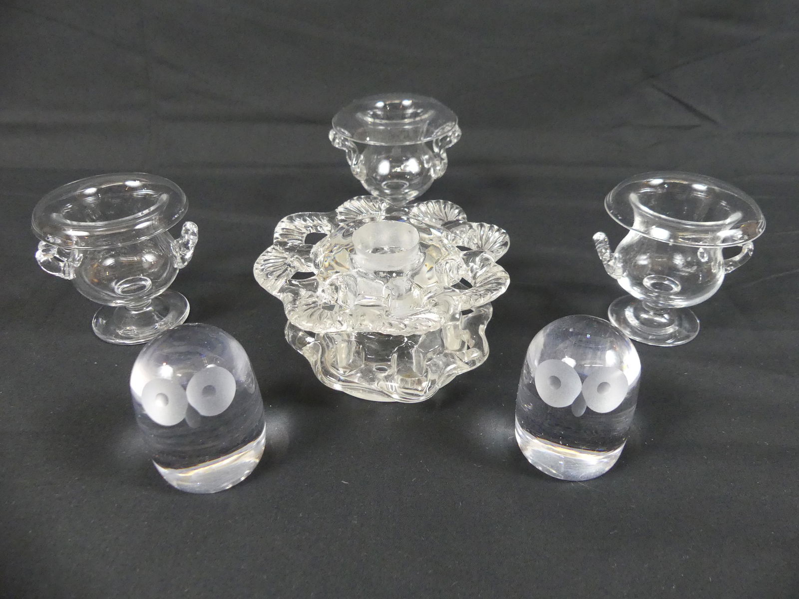 6 SMALL PIECES STEUBEN GLASS: 6 pieces small Steuben colorless crystal: Pair 2.25 in owl paperweights; 3 miniature urns, 2.5 in; 4.5 in flower frog. All good condition.