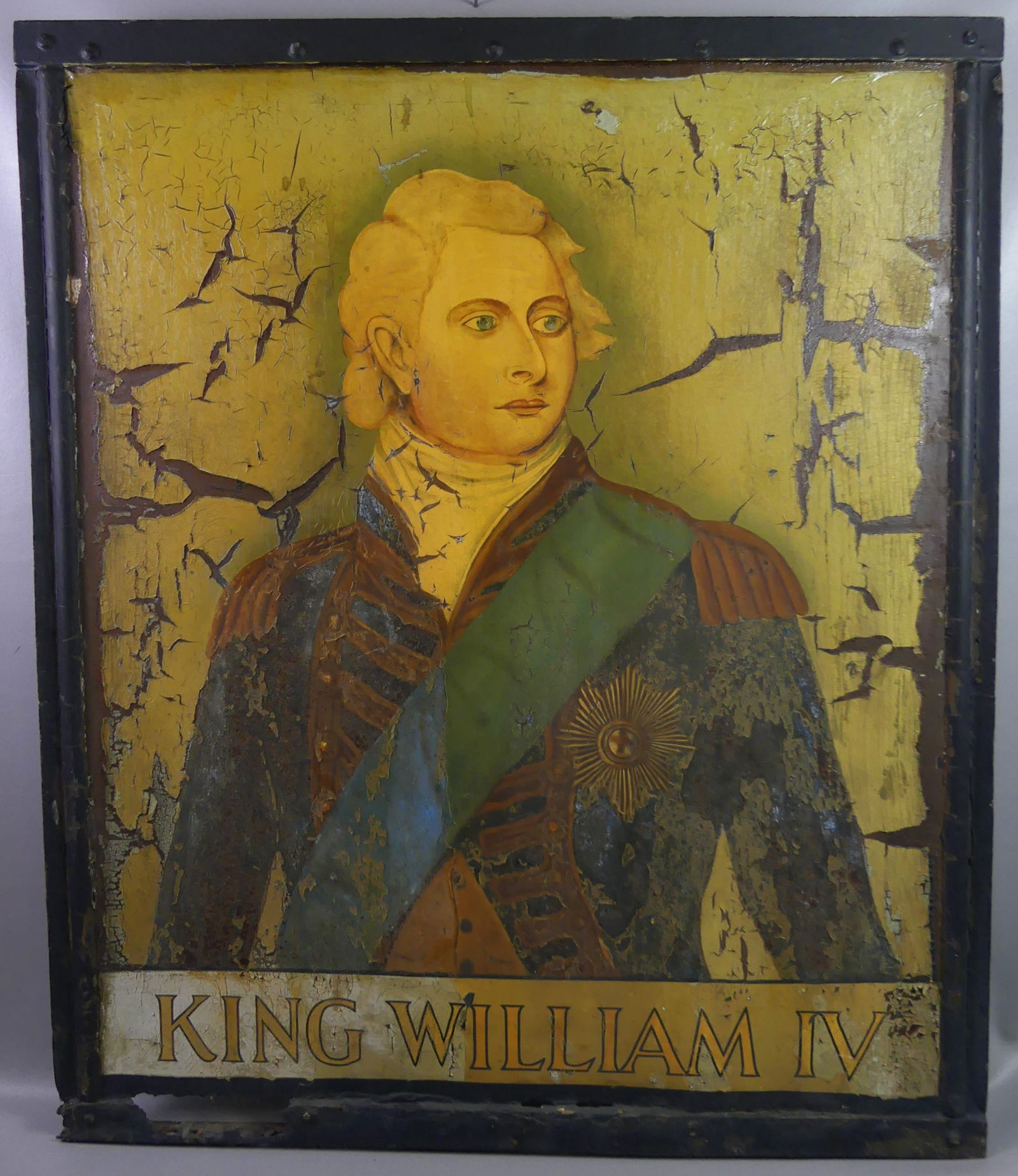 19TH C. TAVERN SIGN KING WILLIAM IV: 19th century iron painted tavern sign (from a pub in Scituate MA). Hand painted double-sided sign with portrait of KING WILLIAM IV (ruled the UK from 1830-37). 43 x 36 in. Sold as is with flaking pain