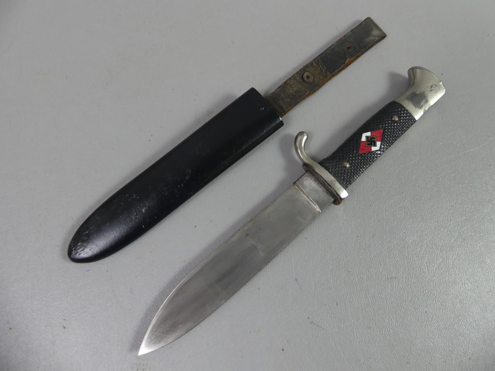 HITLER YOUTH KNIFE: Hitler Youth knife in metal sheath signed M7/68 RZ. 9.5 in long. Made by Tiger, Solingen