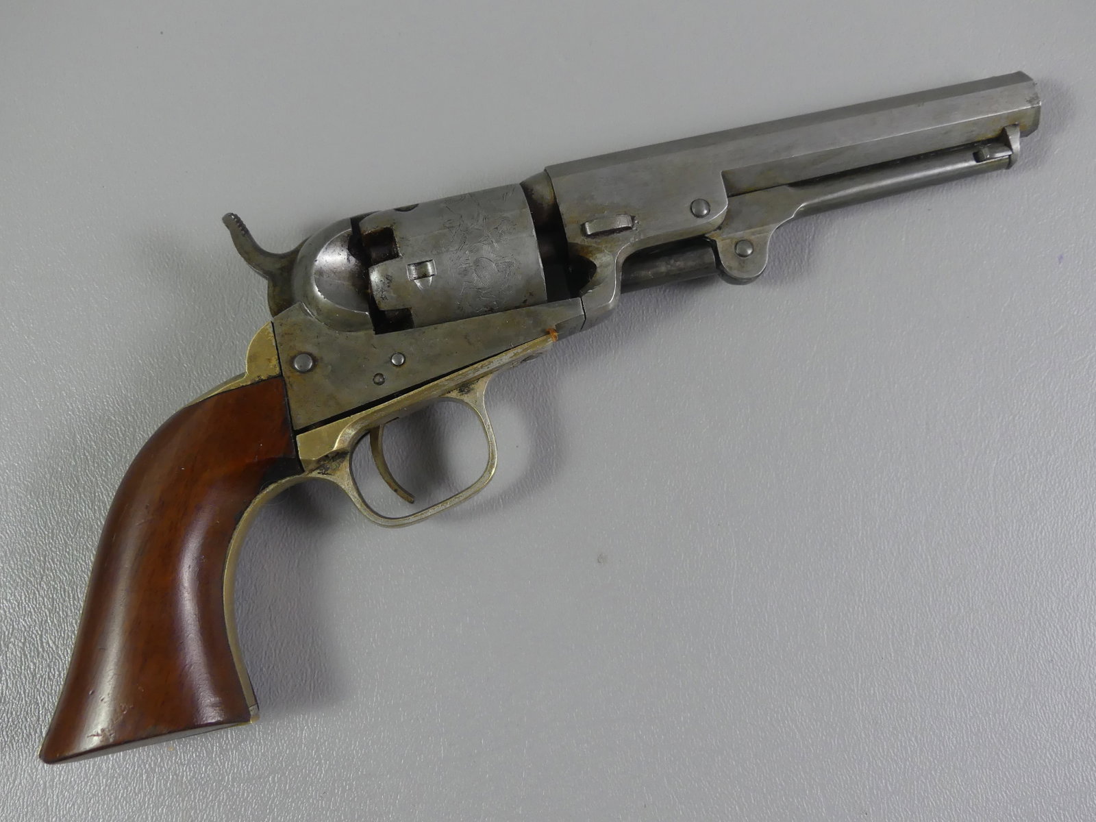 COLT MODEL 1849 POCKET PISTOL: Samuel Colt's Patent 1849 model NY pocket pistol with engraved cylinder having stagecoach robbery scene. Has 5 matching serial numbers 170495. 11 in long, barrel 5 inches. 31 caliber. Good overall con