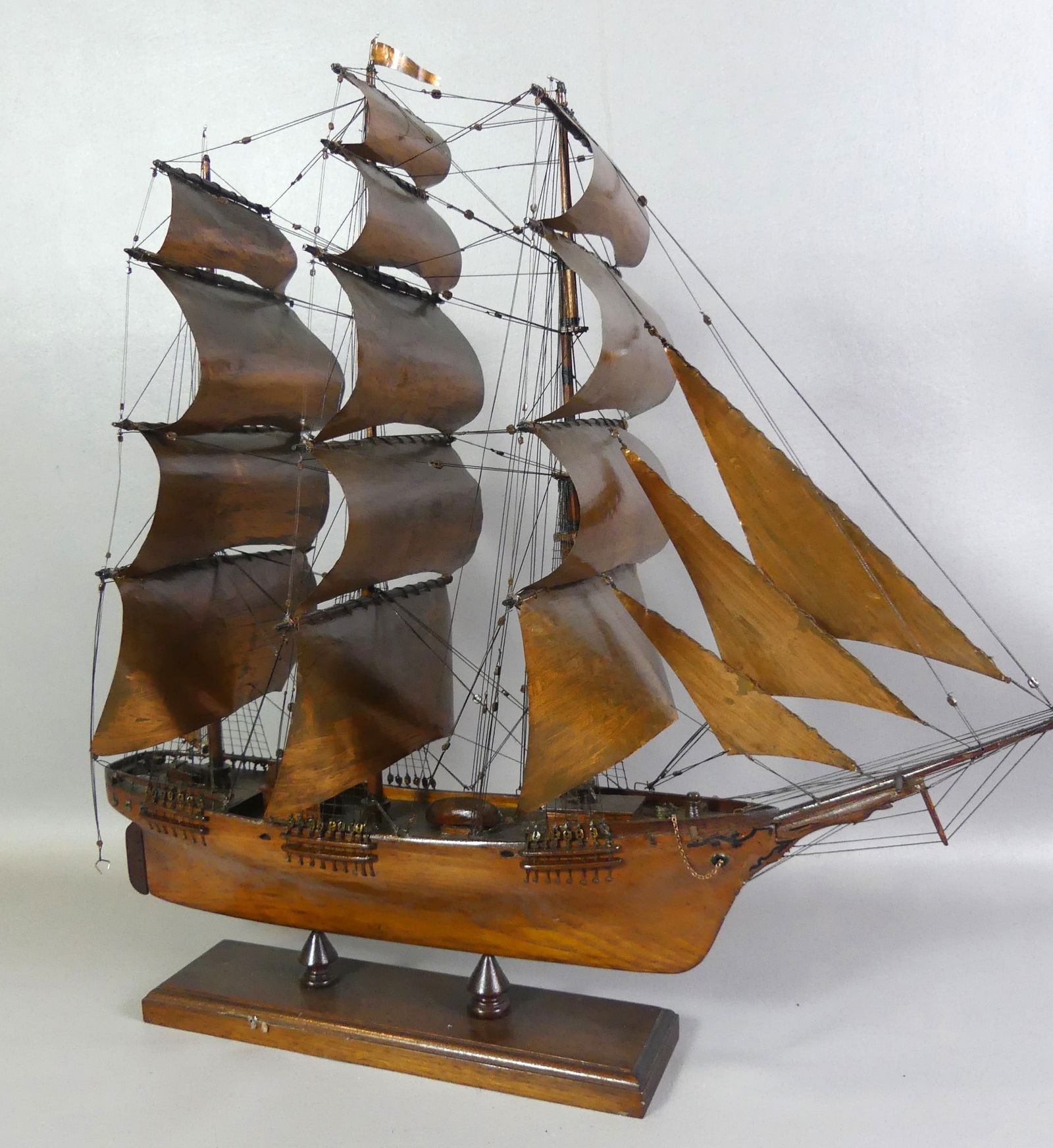 OLD SHIP MODEL: Old wood ship model with copper foil sails. 21 x 21 inches.