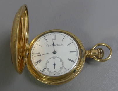 14K GOLD ELGIN POCKET WATCH: 14k gold engraved hunter style pocket watch by Elgin National Watch Co. Interior door is gold plated and engraved 1889 Dickinson. 2 in (50mm) case stamped 122424, movement #2143539.