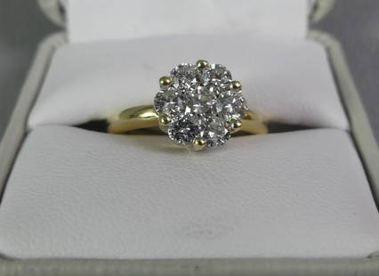 DIAMONDS & 14K GOLD COCKTAIL RING: 14k gold cocktail ring set with 7 diamonds in a floral design, size 6.5, weighs 4.5 dwt. Total weight of diamonds approx. 1.5 carats