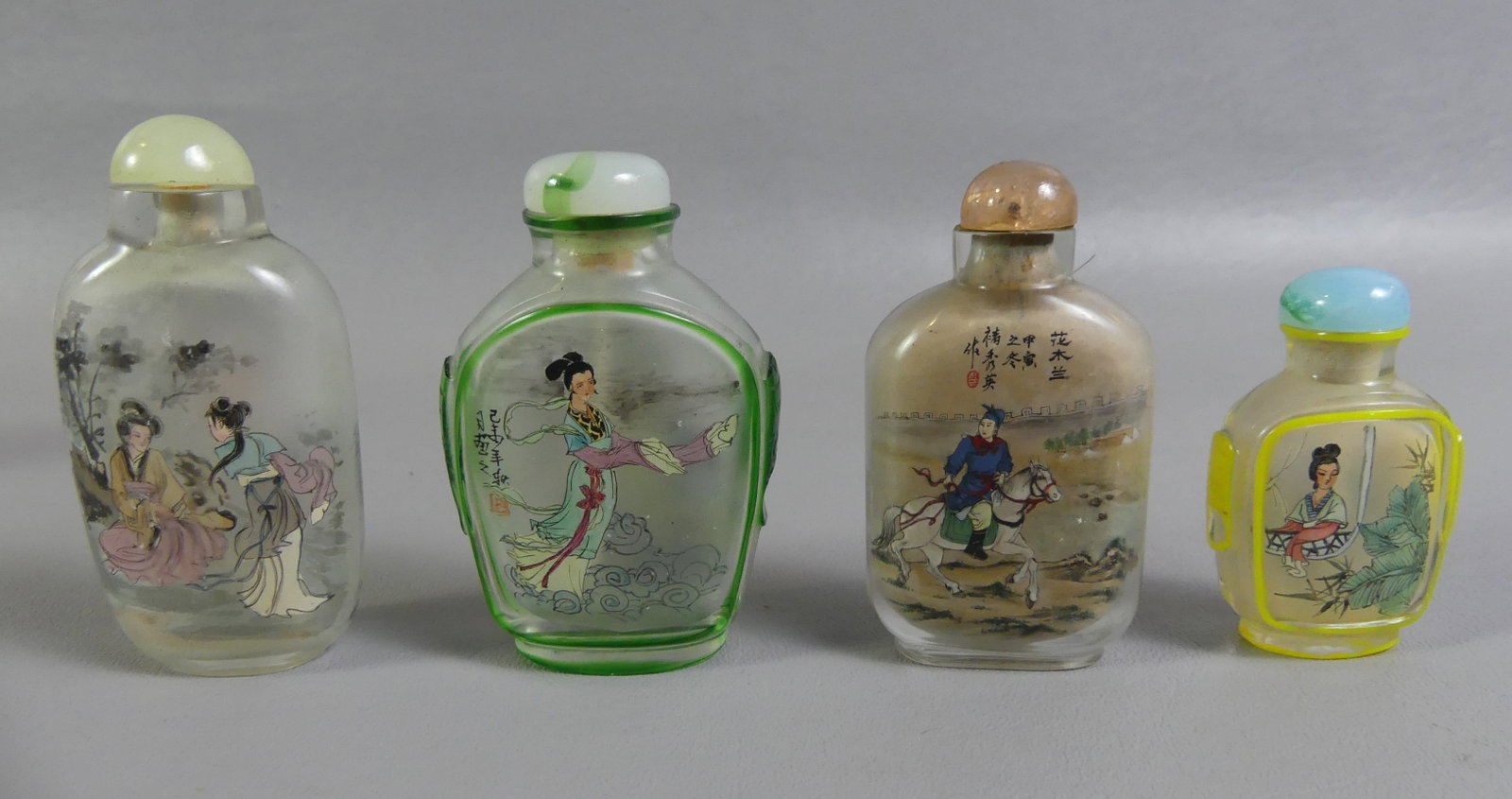 4 CHINESE SNUFF BOTTLES: Lot 4 old Chinese reverse painted snuff bottles to 3.25 in tall including: figures and genre scenes, some signed.