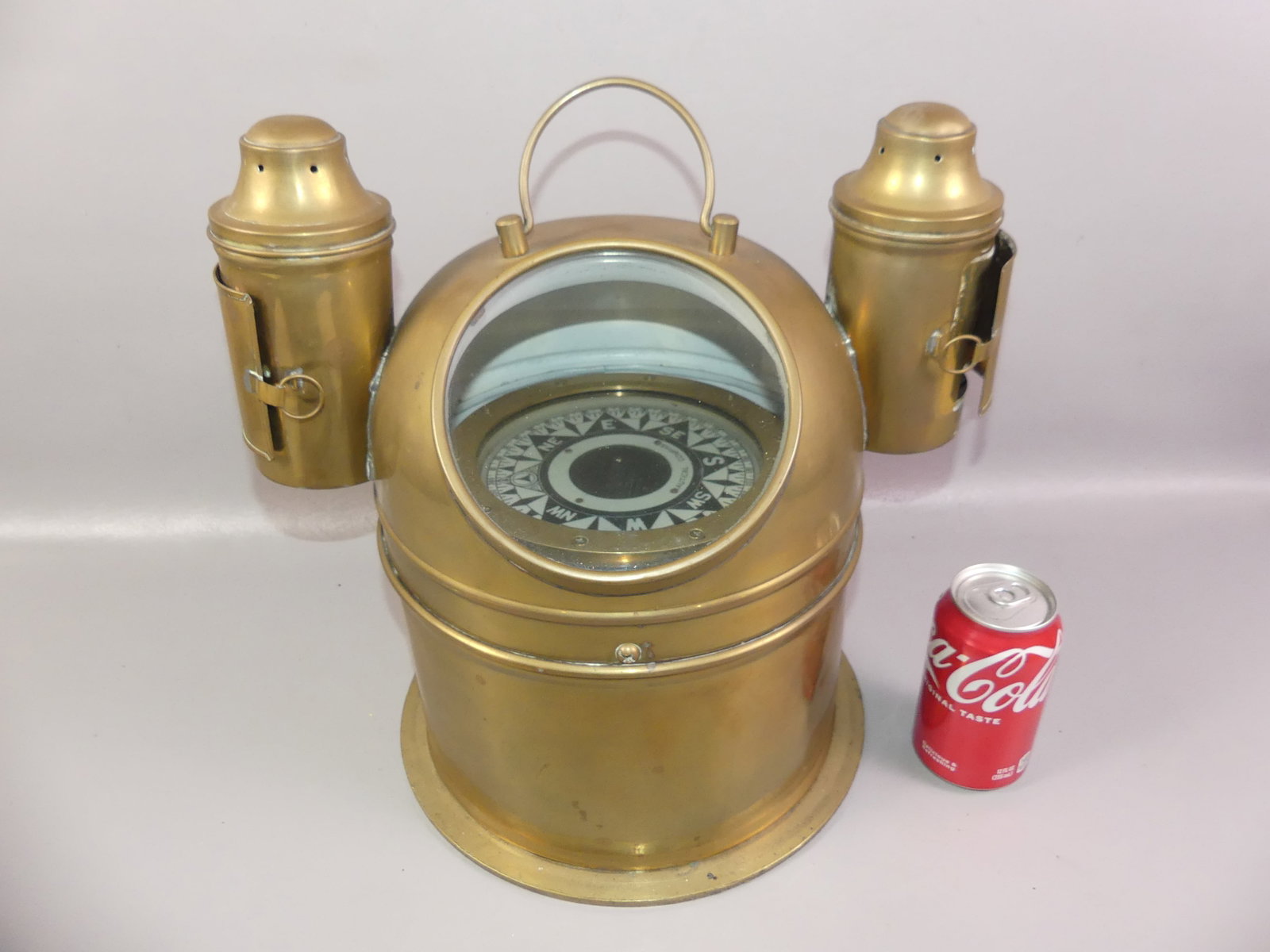 OLD BRASS BINNACLE & COMPASS: Old brass ship's binnacle with interior compass and 2 oil lamps (vintage). 15 in tall by 12 in diameter.