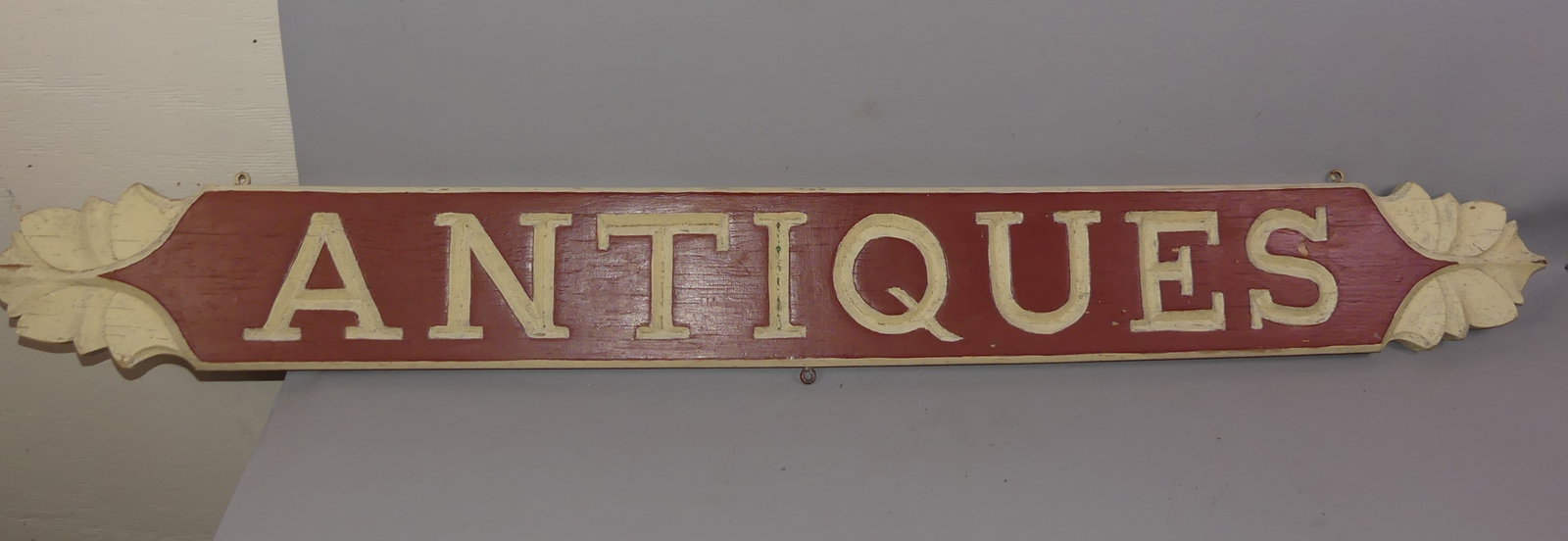 OLD ANTIQUES SIGN: Old wooden painted sign ANTIQUES. 5 ft 2 in by 7 in high.