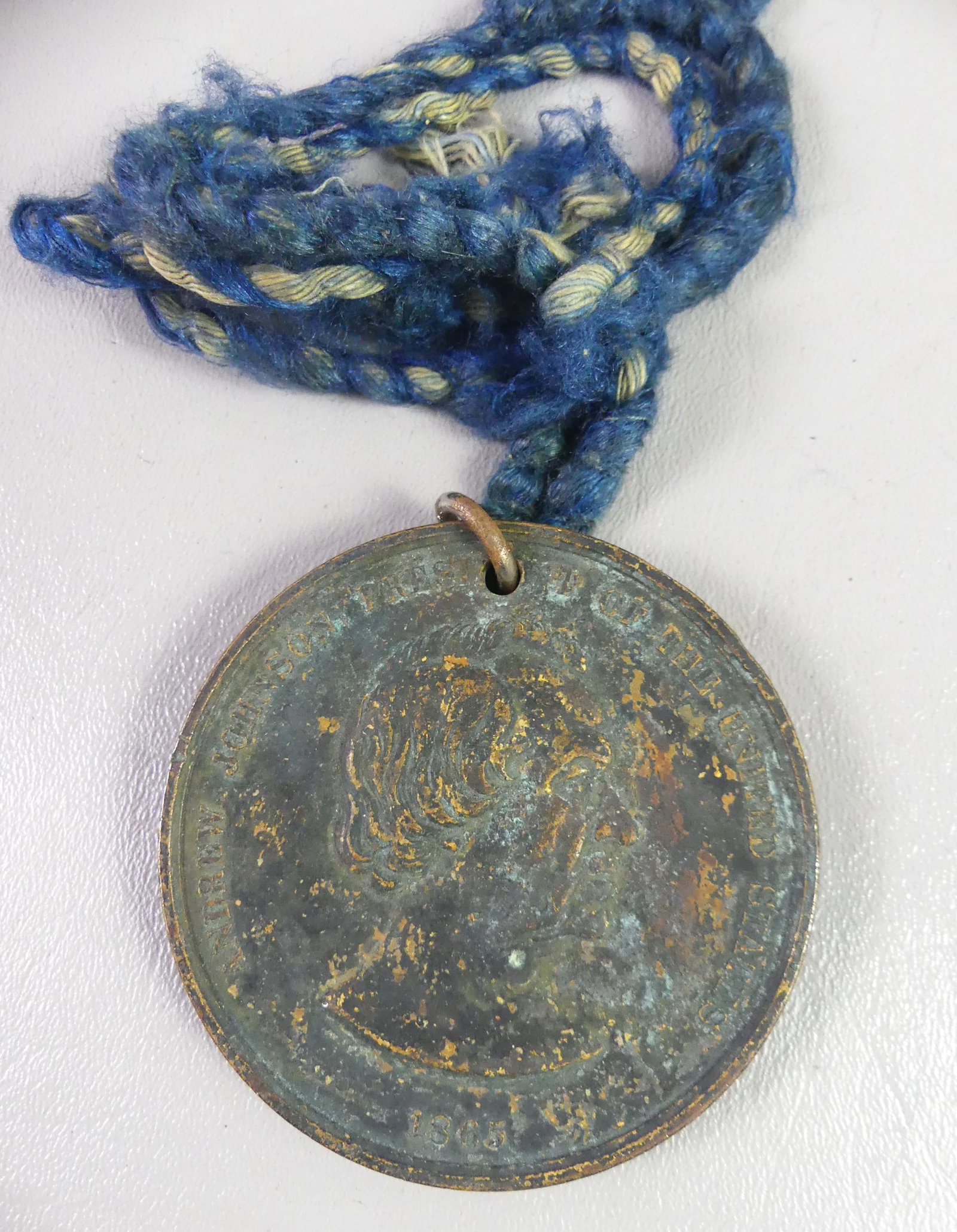 ANDREW JOHNSON BRONZE PEACE MEDAL: Antique bronze presidential peace medal for Andrew Johnson dated 1865. 3 in diameter (7.62cm). Crusty oxidized surface.