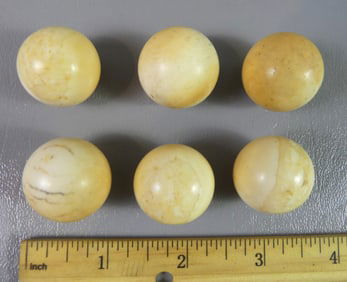 6 RARE WHALE BONE MARBLES