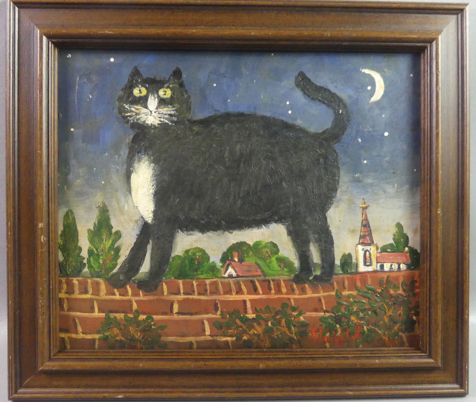 FOLK ART PAINTING OF CAT ON WALL - GLADYS B.: 20th century folk art painting on wood panel of a black and white cat sitting on brick wall with church and crescent moon in background. Signed Gladys B. 12.5 x 15 in, framed 16 x 18.5 in.