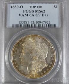 1880-O MORGAN SILVER DOLLAR 8/7 EAR