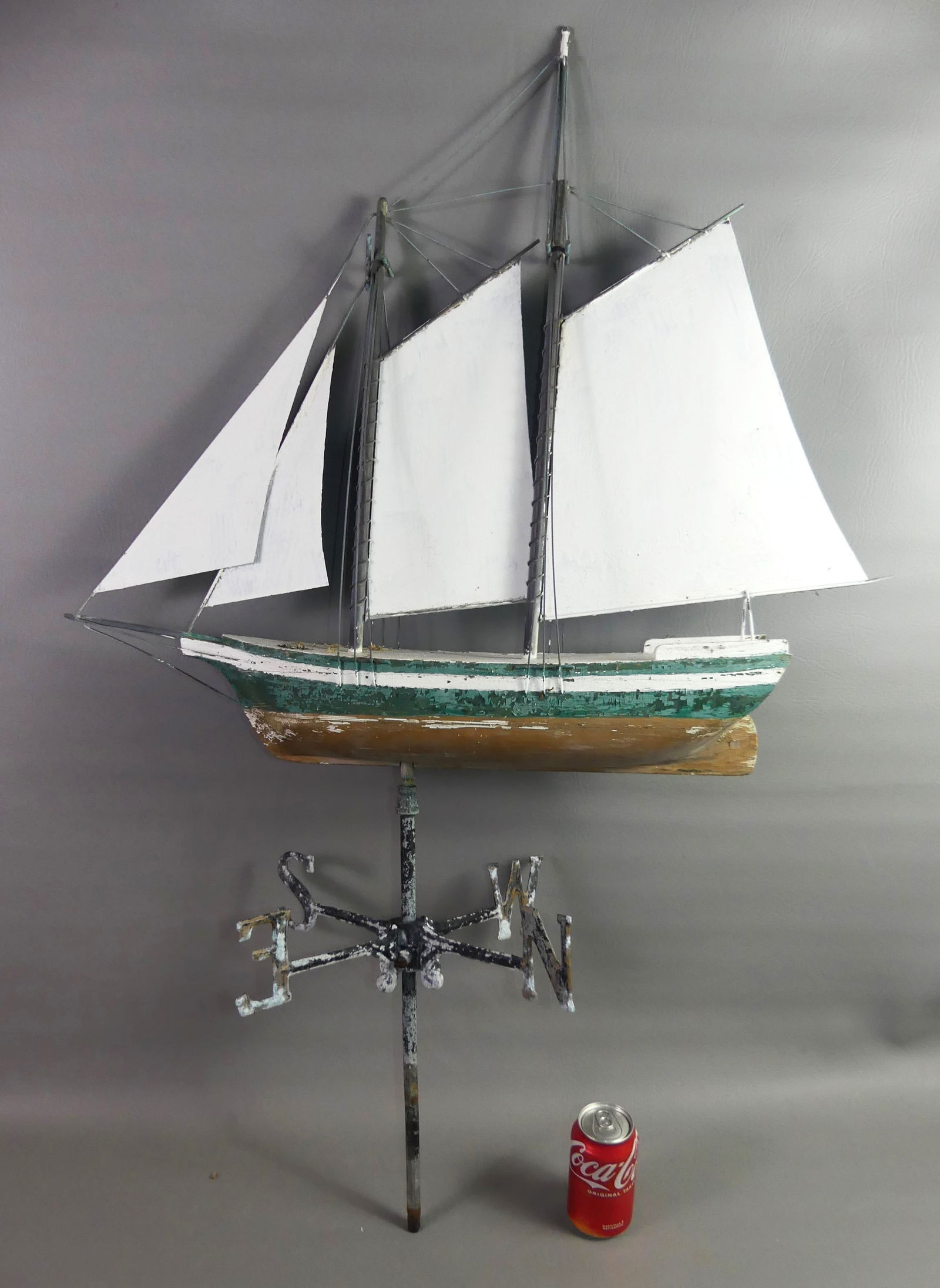 OLD SHIP WEATHERVANE - ADAMS: Old wood and metal ship weathervane on 18 in metal directional. Possibly made by Frank Adams of Martha's Vineyard. Ship is 26 x 28 x 5.5 in wide.