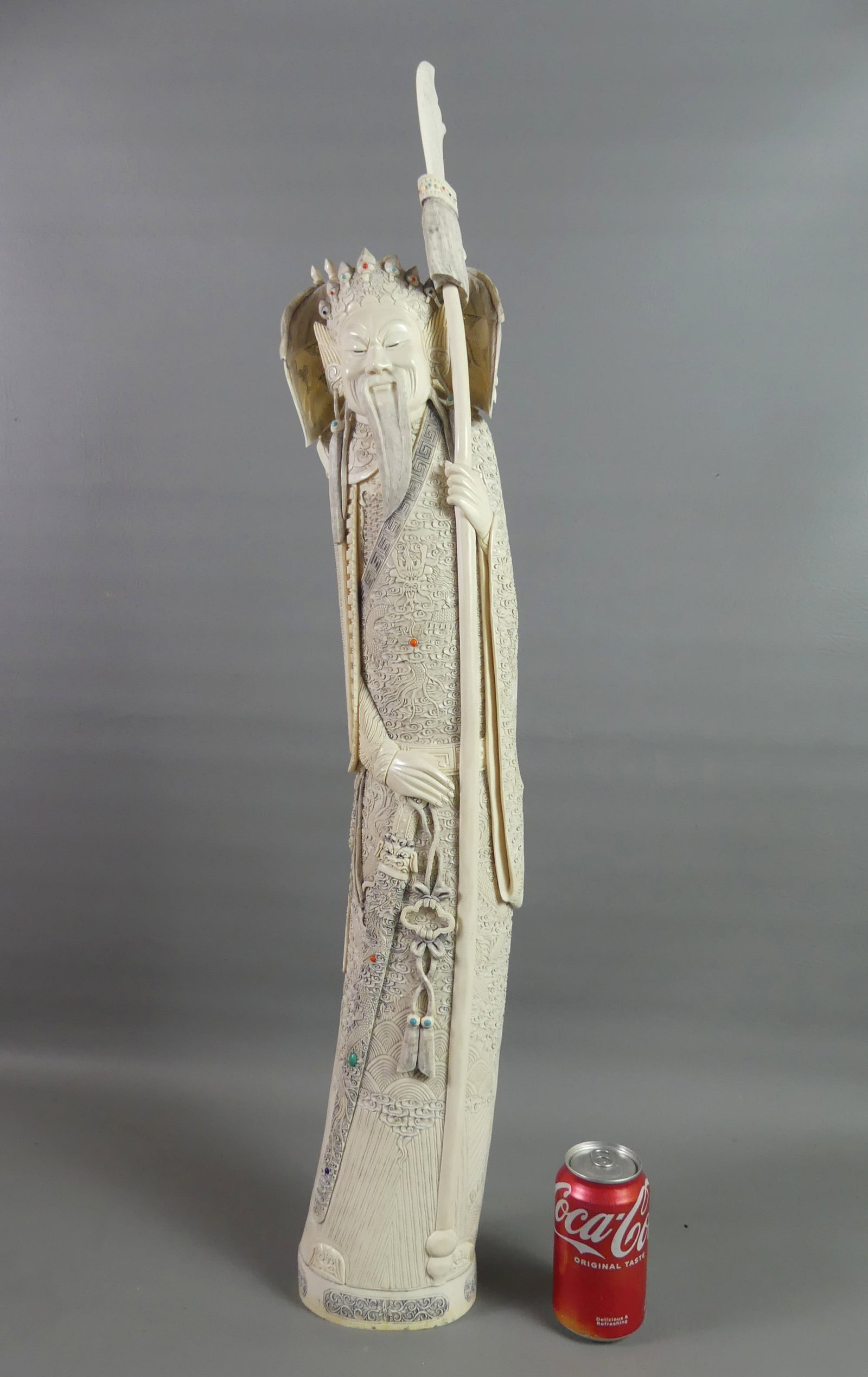 3 FT. CARVED BONE CHINESE GENERAL - SIGNED: A large, exquisite Qing Dynasty carved bone figure of a Chinese general in elaborate uniform with spear, sword and imperial flags (removable). It has scattered turquoise, lapis, malachite and coral in
