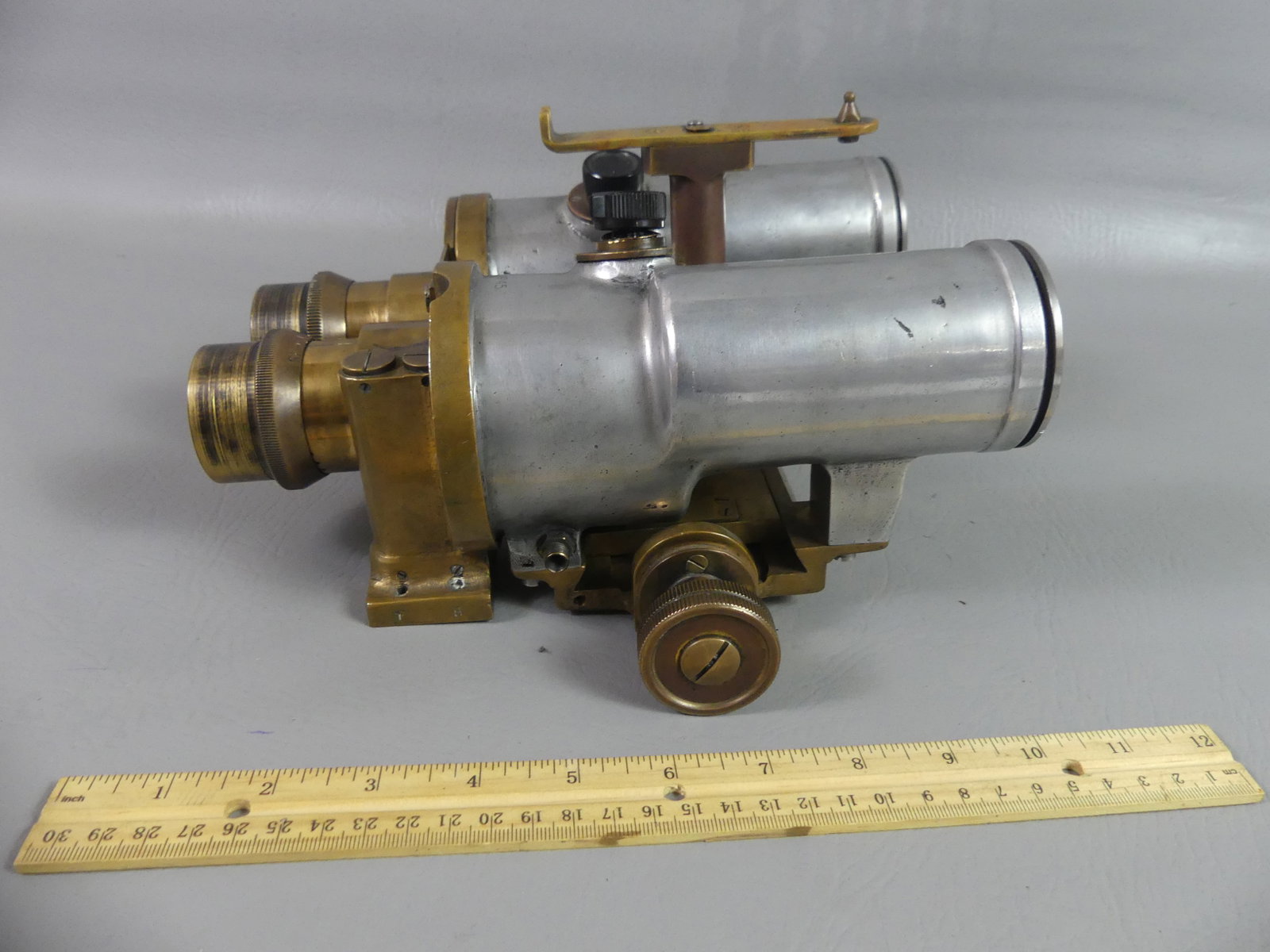 WWII BARR & STROUD MARITIME BINOCULARS: A pair of heavy brass and aluminum long-distance, fixed-mount binoculars signed Barr and Stroud No. 659, Admty Patt. AC2022, 1947 Type GK-5. Lenses have some imperfections/fungus.
