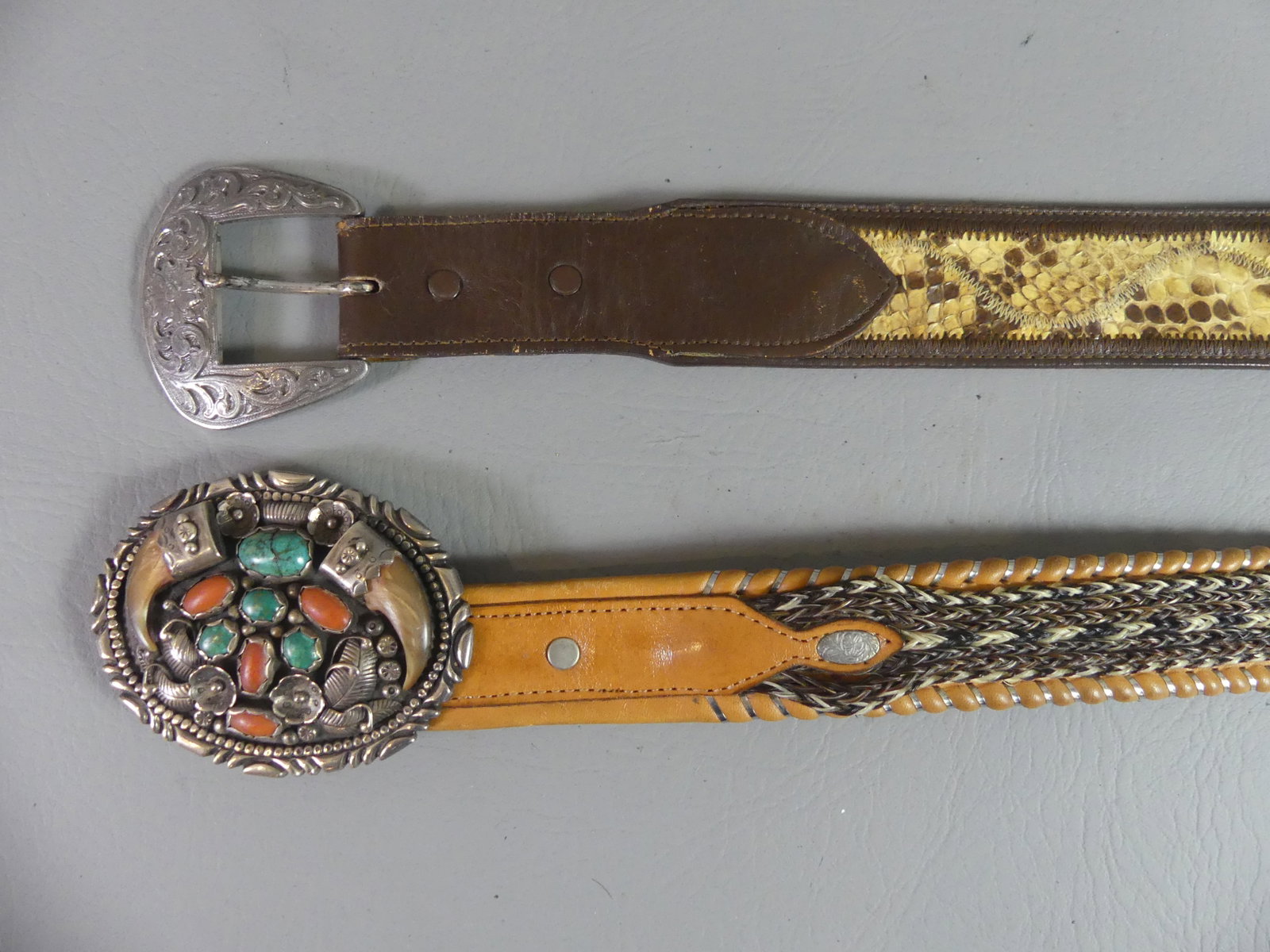 2 BELTS - VANDEVER NAVAJO BUCKLE & PYTHON: 2 fine Southwestern belts, both size 38: Horsehair belt by Circle Y with wonderful Navajo sterling buckle inset with gemstones & 2 bear claws signed A. Vandever, 4 in wide; and a Genuine Python skin a