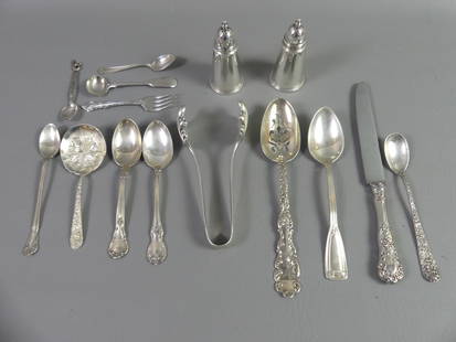 15 STERLING SILVER ITEMS: Lot 15 sterling silver items including Kirk 6.5 inch tongs, Kirk repousse spoon, pair of shakers, etc. 14.2 ozt.