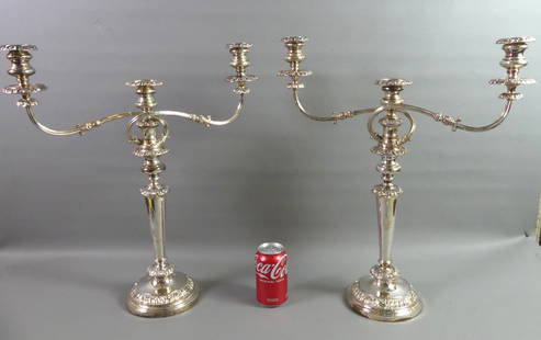 PAIR LARGE SHEFFIELD CANDELABRAS: Pair of large, fancy antique Sheffield silver on copper candelabras, convertible to 13 in single sticks. They have 3 candle holders and are 21 in high by 18 wide. Some scattered wear.