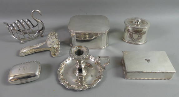 7 SILVERPLATED ITEMS: Lot of 7 old silverplated items including swan-shaped toast rack; Godinger Tiffany reproduction tongs; chamberstick (wear); and 4 assorted boxes to 6 in long.