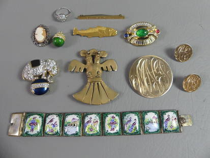 ASSORTED COSTUME JEWELRY GROUP: Lot of assorted costume jewelry: 7 in enameled Asian bracelet; 2.5 inch mythological bird brooch; cod fish pin signed BB&B (Bailey, Banks & Biddle), GF; Carolee elephant brooch; C. Dior pin with