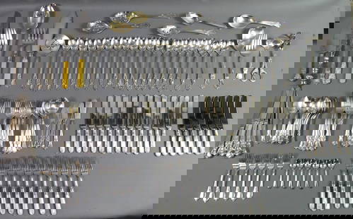 GROUP OF SILVER & PLATED FLATWARE: Large lot of mostly silver plated flatware and large serving pieces. Includes 6 Buccellati Empire pattern seafood forks (tests .925 silver - 4.5 ozt) and 30 pieces of fine abalone flatware with fancy
