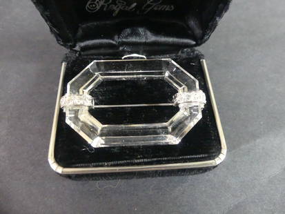 FINE CRYSTAL ART DECO BROOCH: Fine Art Deco period octagonal-shaped, cut crystal brooch, inset with diamonds in platinum on each end. 2 in long. Weighs 8.7 dwt.