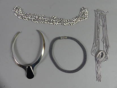 4 SILVER NECKLACES: Lot 4 sterling silver necklaces: Collar necklace with onyx pendant; 8 strand necklace with oval pendant (one chain loose on one end); 16 in magnetic clasp necklace with tiny black stone beads; pearl