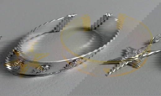 BUSTAMANTE STERLING BRACELET & PENDANT: Sergio Bustamante sterling silver 2 color sun pendant, 1.25 in long; and a bracelet with sun and moon designs by Bustamante stamped GAS 925 Mex. 23.8 dwt.