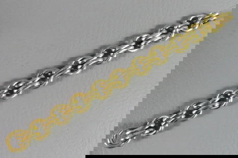 18K GOLD LINK BRACELET: 18k gold link bracelet stamped Germany, 7.5 in long x 5/8 in wide. 33.2 dwt.