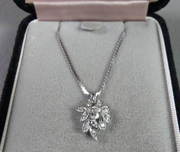 14K GOLD & DIAMOND NECKLACE: 14k white gold necklace with 3/4 inch pendant having inset diamonds. Necklace is 15 in long, weighs 2.8 dwt.