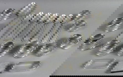 LOT SILVER NAPKIN RINGS & SPOONS: Lot of miscellaneous sterling silver and coin napkin rings (12) plus 5 coin silver spoons to 9 in long. Total 12.5 ozt