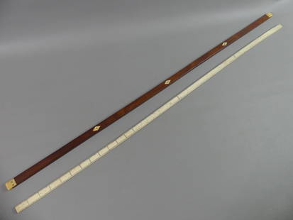 2 WHALEBONE BARREL MEASURES: Lot of 2 whale oil barrel measures: All-bone 36 in long with hash marks; and mahogany with inlaid diamond markers 1/4, 1/2, and 3/4 with whalebone terminals.
