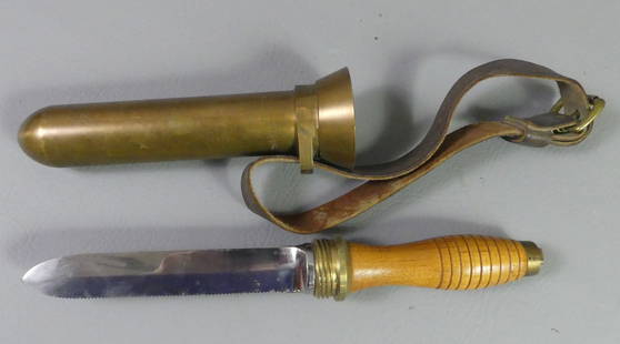 BRASS DIVER'S KNIFE - MORSE: Heavy brass and steel diver's knife in screw-in waterproof container signed -- Manufactured by Morse Diving Equipment Co. Mass USA. Blade is 7 in, overall 12.5 in long. VG condition.