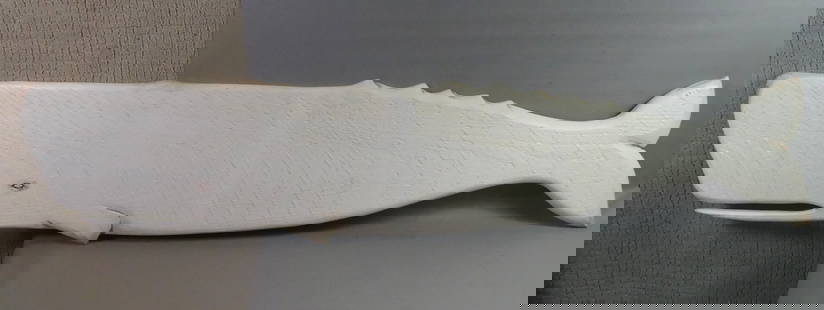 6 FT. CARVED WHALE PLAQUE: Large 6 ft x 15 inch carved wood whale plaque painted white, signed JM 2022.