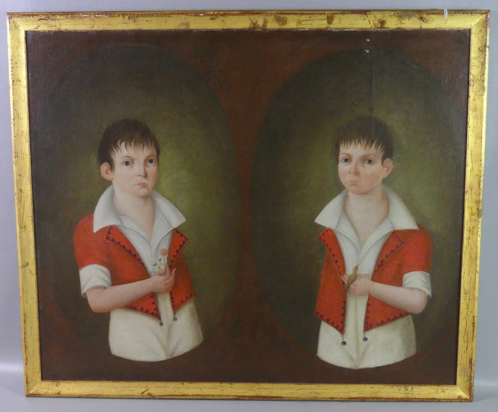 FOLK ART PORTRAIT - TWIN BOYS: Large 19th century double portrait of twin boys, one holding bird, the other a flower. Has been relined with restoration. Unsigned. 31 x 37 in, framed 34 x 40 in.