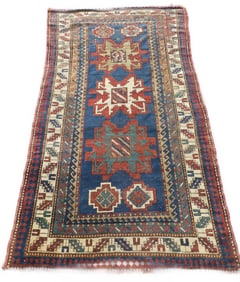 ANTIQUE KAZAK RUG