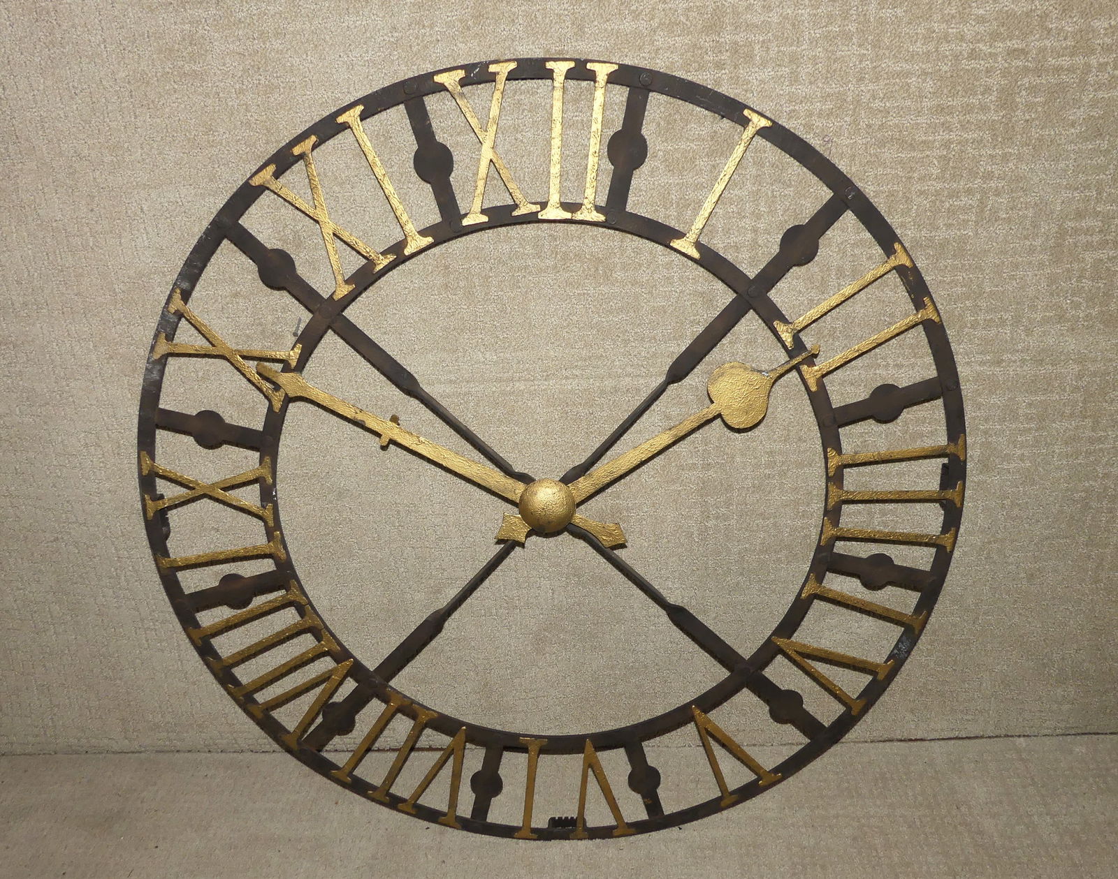 LARGE IRON WALL CLOCK: Large vintage painted iron wall clock (decorative only). 42 in diameter.
