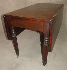 ANTIQUE MAHOGANY DINING TABLE