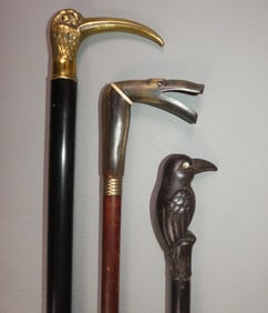 3 CARVED ANIMAL CANES