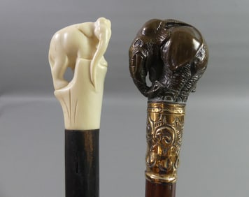 2 CARVED ELEPHANT CANES