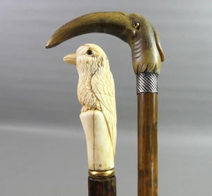 2 CARVED BIRD CANES