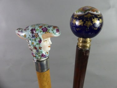 2 PORCELAIN HANDLED CANES
