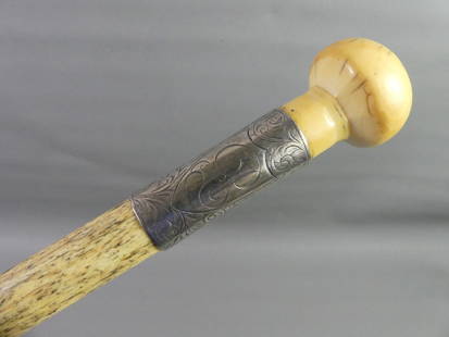 CAPTAIN WHALEBONE CANE: 19th century sailor made captain's cane in all-whalebone with engraved silver collar (monogram) and accession numbers near tip. 33 in long.