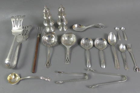 GROUP OF STERLING OBJECTS INCL. JENSEN: Lot of assorted sterling silver: Pair G. Jensen USA sterling shakers; Jensen spoon; Jensen oliver or pickle fork; Large petitfors server by Whiting; Cartier cocktail fork with wood handle; tea straine