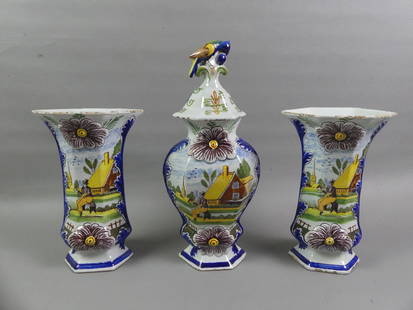 3 ANTIQUE DELFT POTTERY VASES: Lot of 3 antique Deflt art pottery vases, center vase has lid with . Includes pair of 10 in vases and the 14.5 in covered vase. No marks. All 3 have some scattered glaze roughness and minor flakes.