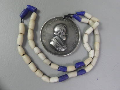 ABE LINCOLN PEACE MEDAL 1862: Old Presidential Peace Medal for Abraham Lincoln dated 1862 in silver or silvered bronze, stamped under bust S. Ellis Del. 3 in diameter, has Indian scenes verso and carved stone necklace.