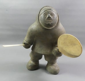 INUIT SCULPTURE - ESKIMO WITH PADDLE