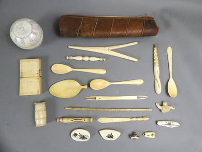 LOT 20 MOSTLY SMALL INUIT ITEMS: Lot of approximately 20 items, most carved bone and Inuit, including: 2.5 in round covered box, spoons, pocket knife, implements, card case (as is), scrimshaw pins, etc.