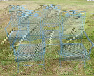 4 OUTDOOR IRON CHAIRS: Set of 4 old, fine quality iron outdoor mesh chairs with floral crest (they rock on base). 42 in high x 22 w x 17 d. Good condition.