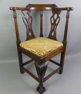 ANTIQUE CHILD'S CORNER CHAIR: 19th century child's Chippendale walnut corner chair with ball and claw foot. 26.5 in high x 13 x 13