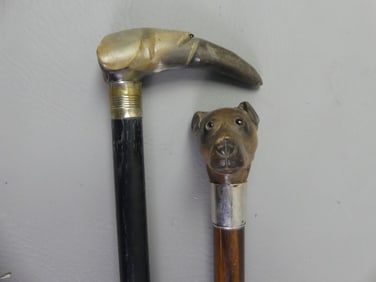 2 CANES WITH DOG HEADS